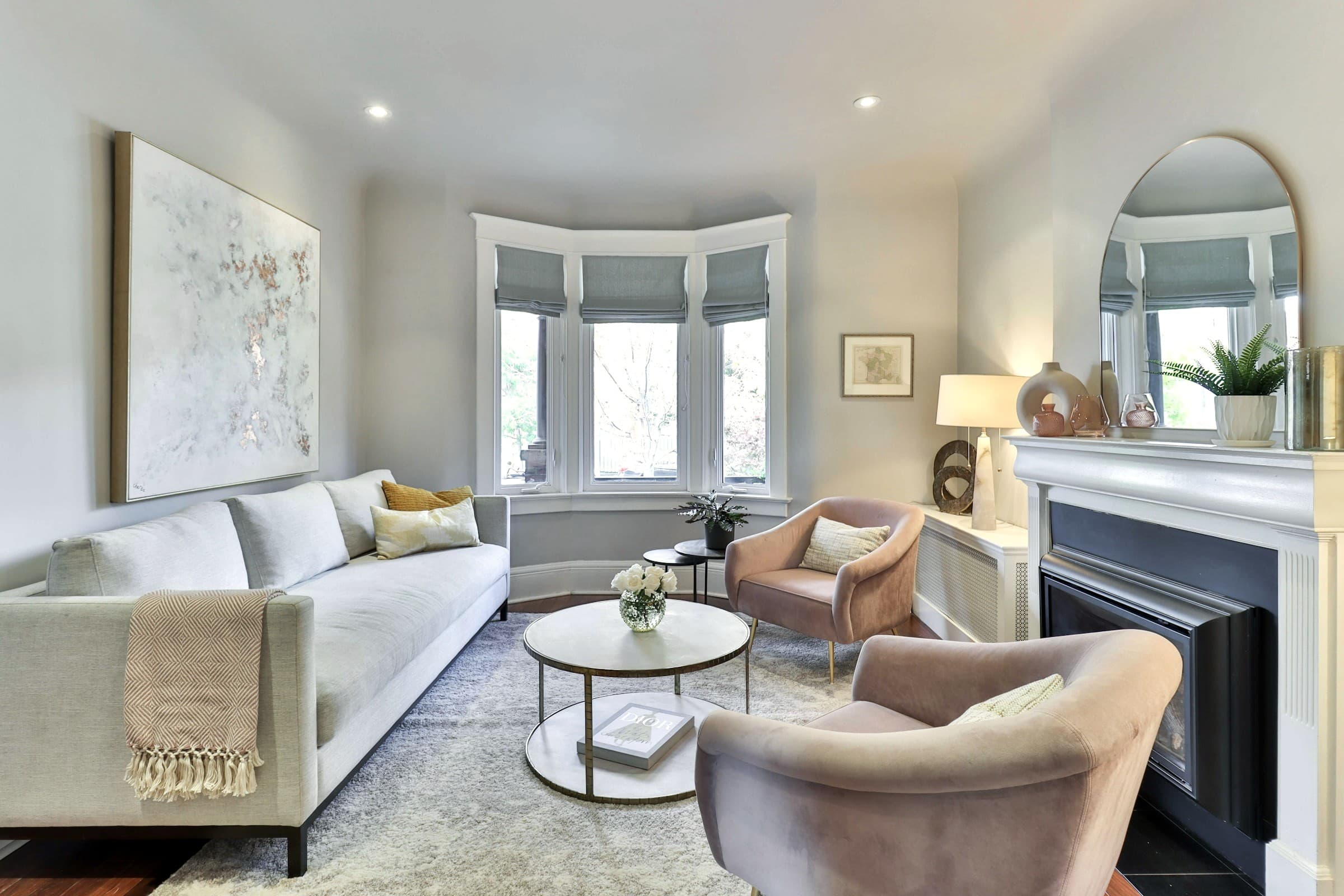 Bright living room with a bay window seat and low upholstered seating