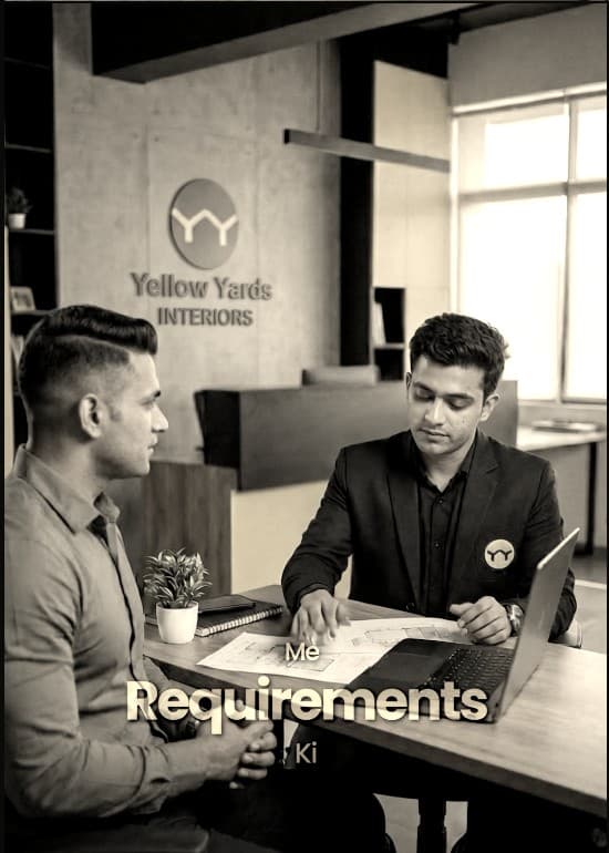 Two people reviewing floor plans across a desk at the YY Interiors studio